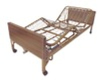 Volledig elektrisch aangedreven bed met rails over de volledige lengte en therapeutische matras