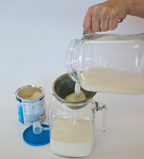 Mixing containers Do Not come with the Strainer.
