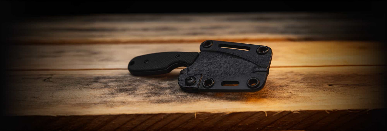 GW2 fixed blade knife secured in its protective sheath, highlighting a durable and ready-for-action design.