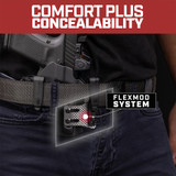 Lifestyle of Glock 17 with a Streamlight TLR-7 in a Tulster ARC kydex light-bearing holster carried inside the waistband (IWB) in the appendix position highlighting the flexmod dual clip system.