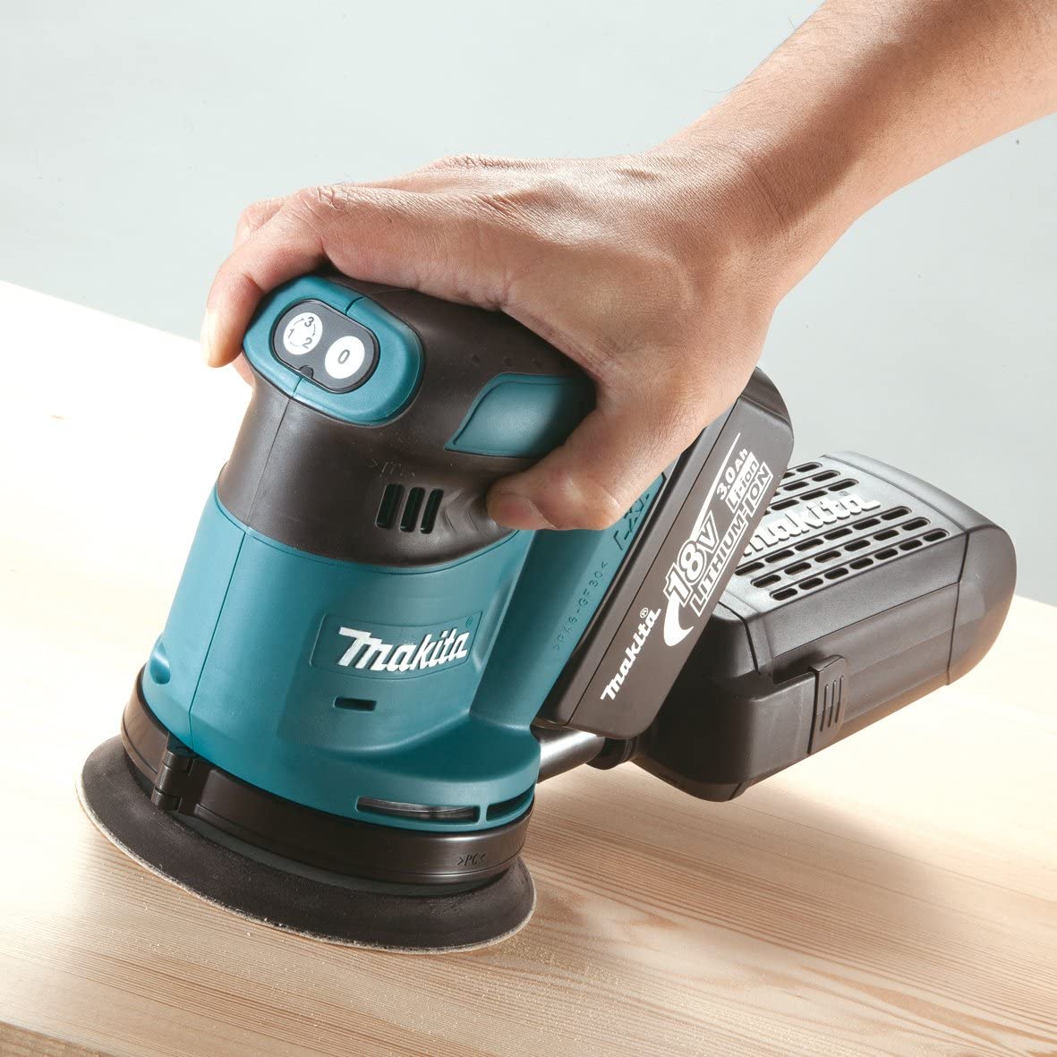 Makita 18v 5" R/orbit Sander (Body Only) MAKDBO180Z | Dust is extracted through 8 holes under pad, leaving a clean work area. | toolforce.ie
