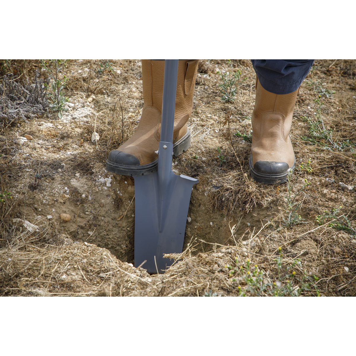 Spade is very versatile and can break all ground types and chop through roots.