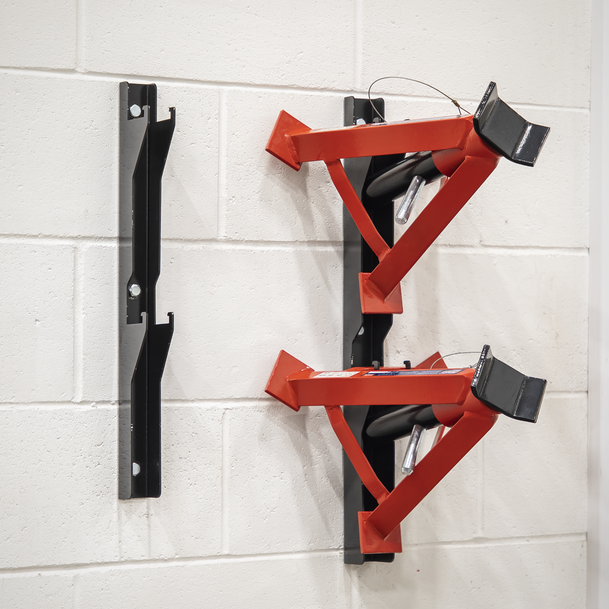 SPACE SAVING - Saves floor/cabinet space by enabling axle stands to be mounted securely to a wall.