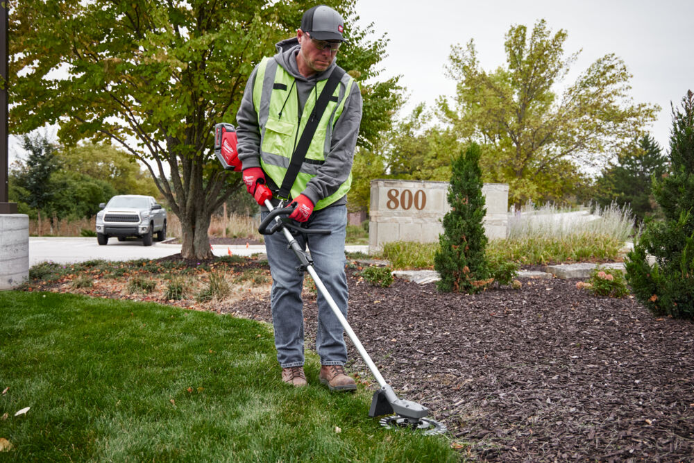 Milwaukee cutter for removing  weed on travel surfaces