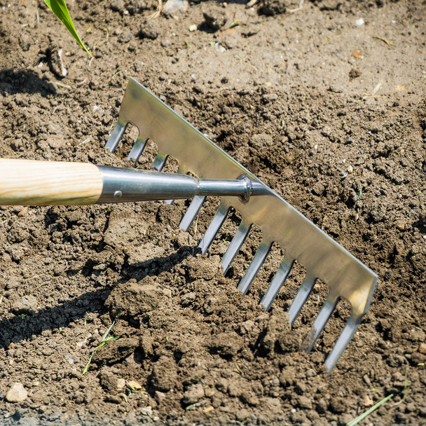 Garden rake for cultivating and levelling the soil