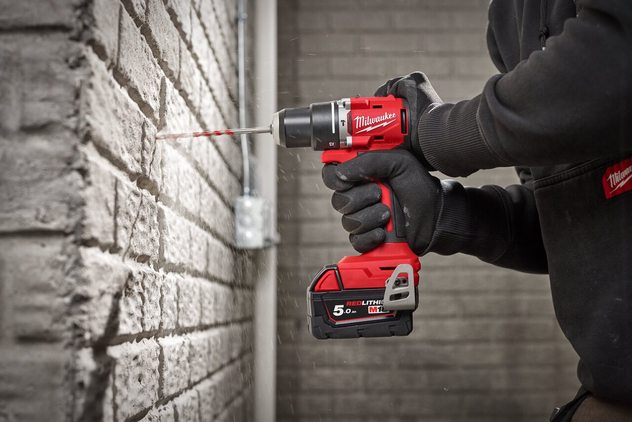 Compact brushless percussion drill measuring 145 mm in length for access into tight spaces