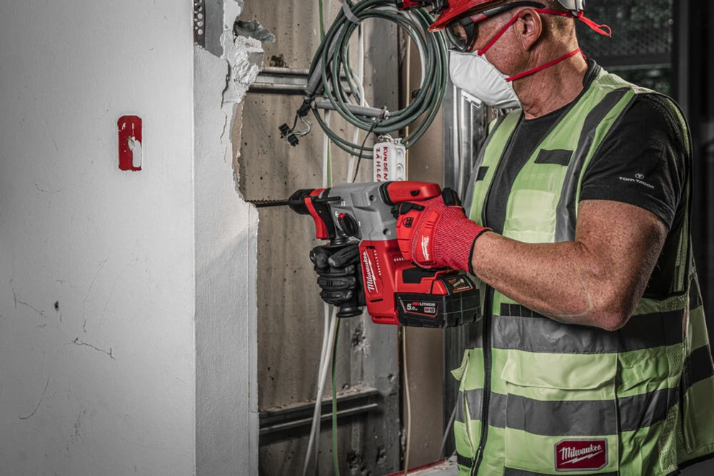 hammer drill drilling wall