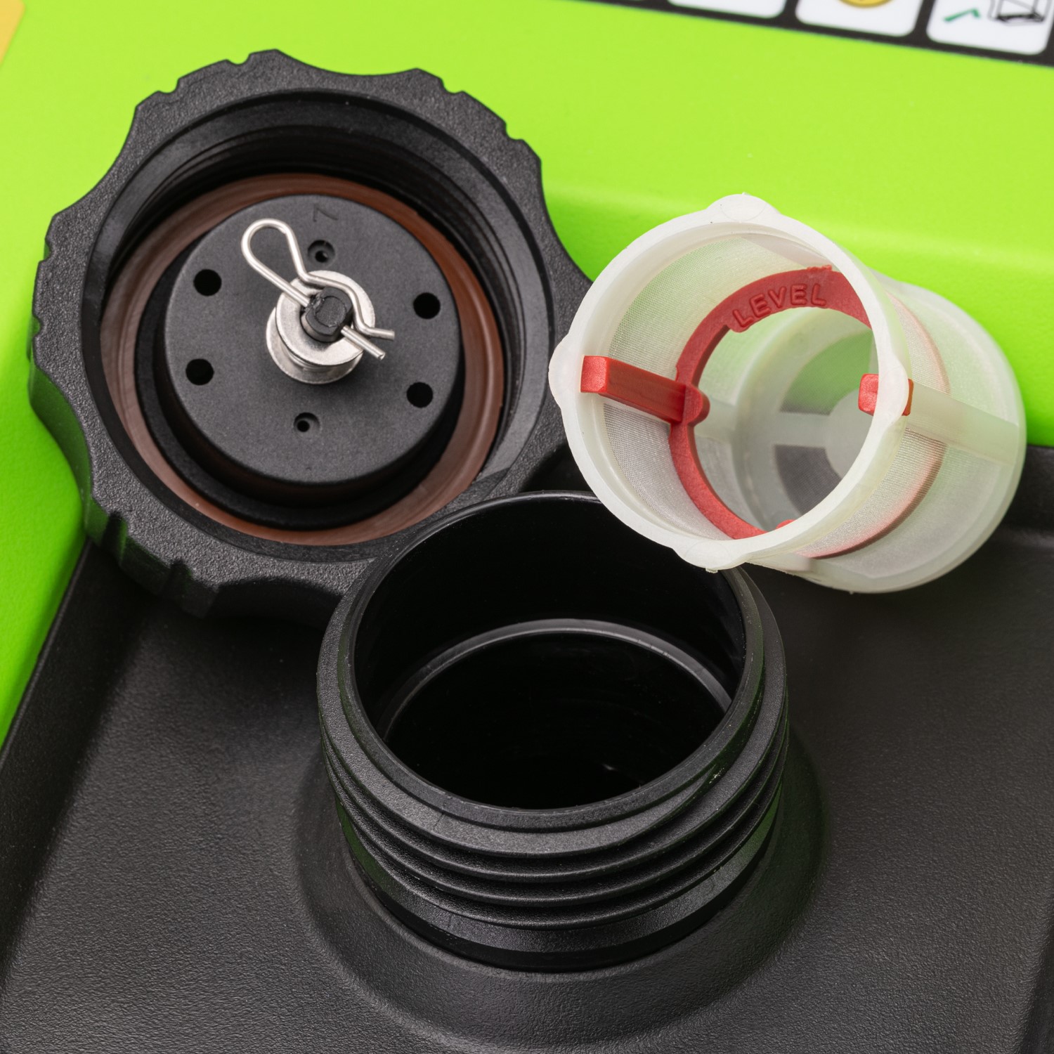 Close-up of the SIP ISG4500 fuel tank cap, filler neck, and removable fuel strainer filter