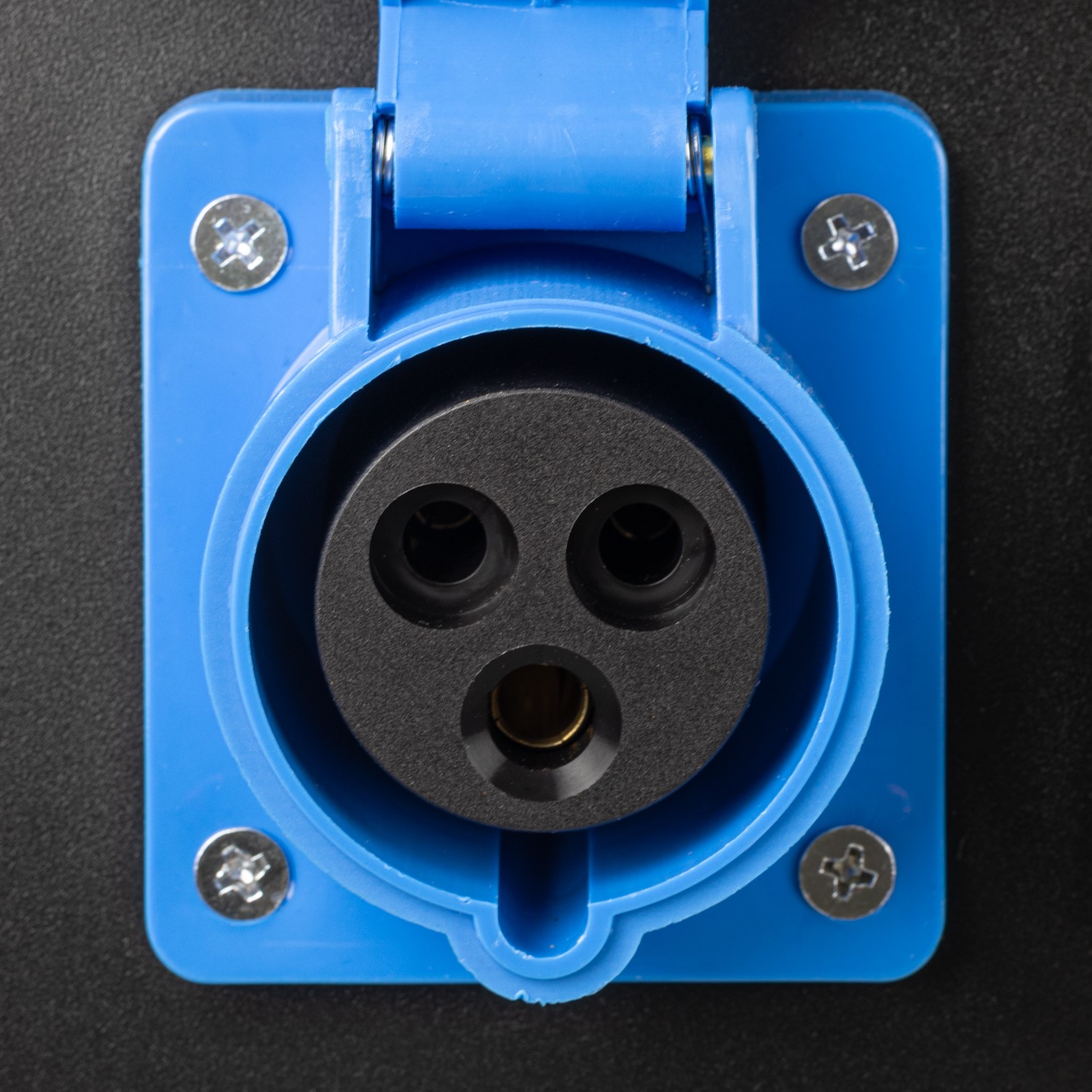 Close-up of the 230V 16A blue industrial output socket on the SIP ISG4500 generator panel