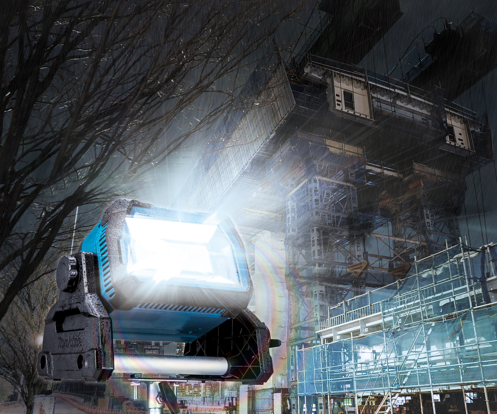 Makita DML809 LED worklight illuminating a work area in low-light conditions