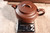 The handmade Yixing Zisha teapot is shown on a precision scale with an approximate weight of 7.1 oz (201 g). As each piece is individually handcrafted, slight variations in weight may occur.