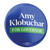 Amy Klobuchar - Green Box (2.25" Pin-Back Button -- Pack Of Two!)