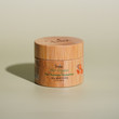 Pure Turmeric Moisturizer by Shira with green background