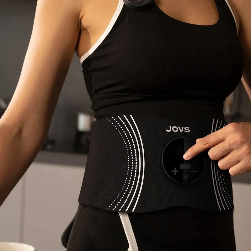 Close-up of the JOVS EMS Sculpting Belt being worn and adjusted