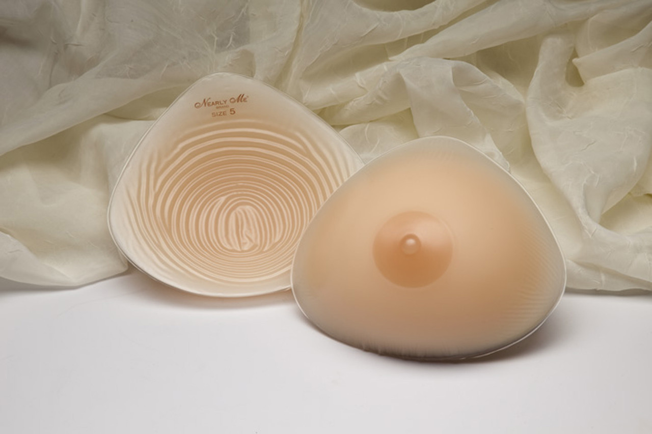 Premium Photo  Breast prosthesis before inserting it into the