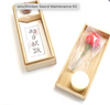 Premium Japanese sword maintenance kit featuring Choji oil, Uchiko powder, and Nuguigami. Ideal for caring for Iaito and Shinken blades with traditional methods