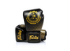 The Fairtex X Rajadamnern Premium Boxing Gloves BGV-RAJADAMNERN combine premium performance, superior protection and exclusive Rajadamnern Stadium styling for Muay Thai, boxing and kickboxing training.