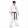 White Kyokushinkai karate uniform featuring a traditional full-contact karate cut, durable 11oz canvas construction, blue embroidered Kyokushinkai logo on the jacket and matching white karate belt. Designed for Kyokushin karate training, this traditional karate gi provides freedom of movement for kicks, punches and full-contact practice.