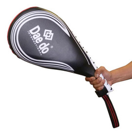 Improve your kicks with the Daedo Double Kick Paddle for Tae Kwon Do. This foam-covered kick paddle offers dynamic target practice and lasting value. Perfect kick paddle for Tae Kwon Do enthusiasts. Improve your kicks with the Daedo Double Kick Paddle for Tae Kwon Do. This foam-covered kick paddle offers dynamic target practice and lasting value. Perfect kick paddle for Tae Kwon Do enthusiasts.