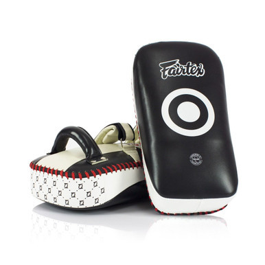 Fairtex KPLC2 Curved Leather Kick Pads made from premium cowhide leather with a high-density foam core and ergonomic curved design. Sold as a pair for Muay Thai training.