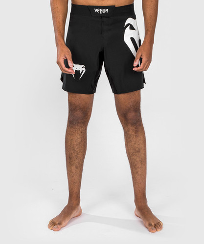 Venum Light 5.0 Fight Shorts are available in colors. This black-white colorway pairs well with Venum’s fight gear and performance apparel for combat sports.