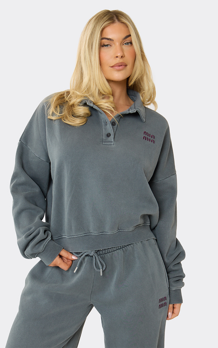 Long Sleeve 'Min Min' Embroidered Graphic Polo Sweatshirt In
