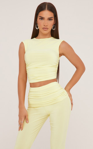 High Neck Sleeveless Top And Low Rise Fold Over Flared
