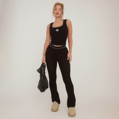 High Waist Skinny Flared Trousers In Black Waffle Knit | EGO