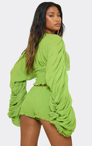 Mid Rise Frill Hem Detail Hotpants Shorts In Green Shirred