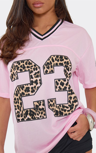 Short Sleeve V Neck 23 Graphic Detail Jersey Top In Pink | EGO US
