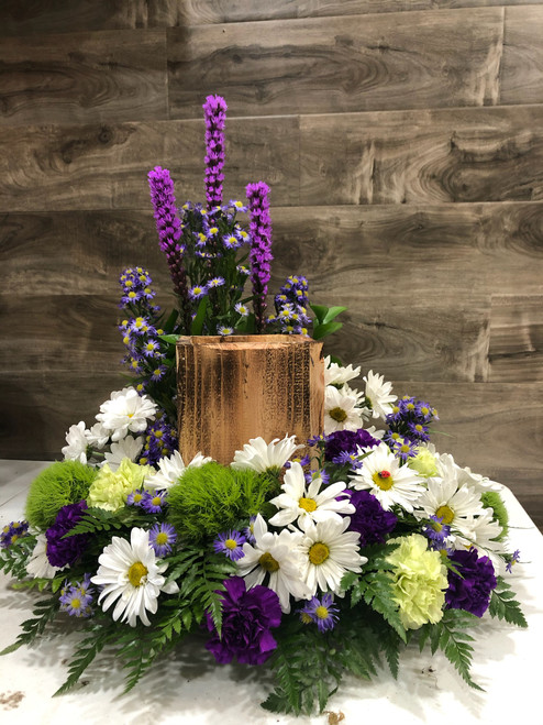 Honor your loved one with this subtle and serene urn piece.  To select a different color scheme, just note your preference in the notes area.  To upgrade to include roses or specific flowers, upgrade to deluxe or luxury and note your choices as well.  For really specific choices, call or visit our store.