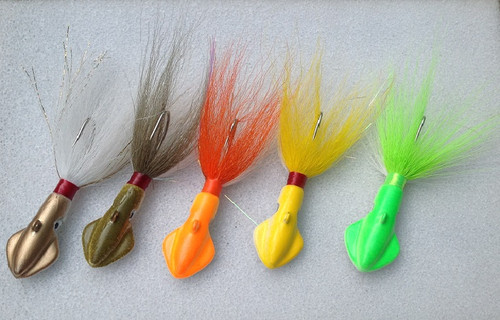 Left to right; White/Gold Squid, Olive/White Squid, Orange/White Squid, Yellow/White Squid, Lime/White Squid. Bucktail Jigs.