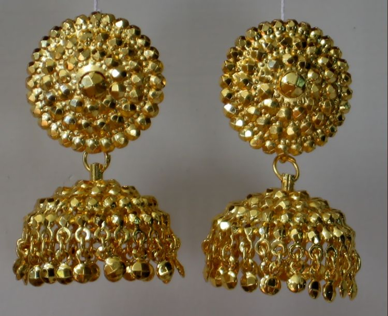 Premium Photo | Indian rajasthani antique gold tone traditional stylish  gold plated jhumka earrings