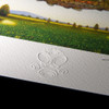 Embossed artist logo 