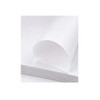 Close-up of stacked freezer paper sheets with top sheet curled upward