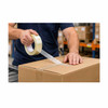 Worker applying 3/4" x 55 yd 7 mil bi-directional filament tape to reinforce a cardboard shipping box in a warehouse