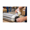 Worker bundling metal tubes with reinforced Bi-Directional filament strapping tape