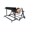 Rear angled view of Encore EP-6495 Industrial Sheet Cutter with large kraft material roll and mobile dispenser stand