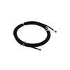 Black industrial hose coiled for storage with brass end fittings