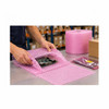 Worker wrapping a circuit board with pink 3/16" anti-static air bubble cushioning in a warehouse