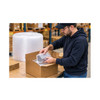 Warehouse worker packing a bubble-wrapped product into a cardboard shipping box