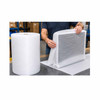 Worker wrapping a computer monitor with 1/32" polyethylene foam for shipping protection