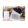 Warehouse worker wrapping a monitor with white polyethylene foam for protective packaging