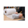 Close-up of worker wrapping a product with heavy-duty 1/2" air bubble cushioning