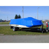 Blue marine shrink wrap covering a boat on a trailer for outdoor storage and weather protection