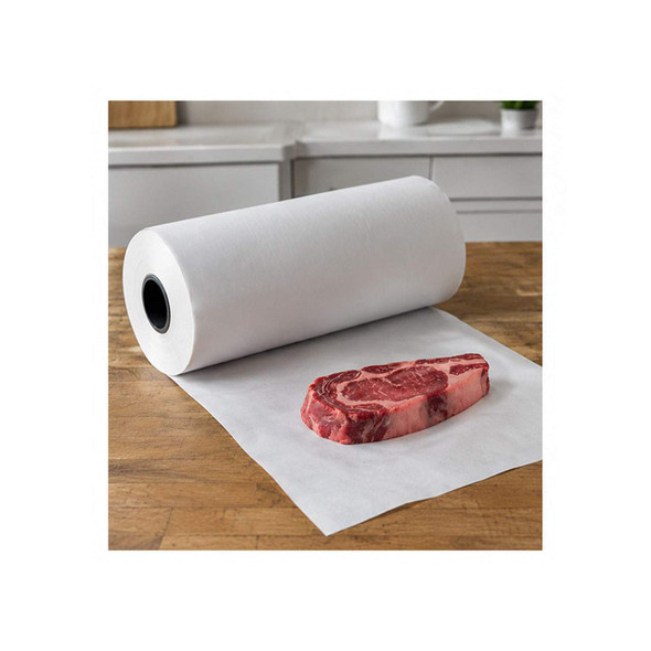 White freezer paper roll unrolled on a wooden work surface with a raw steak ready for wrapping