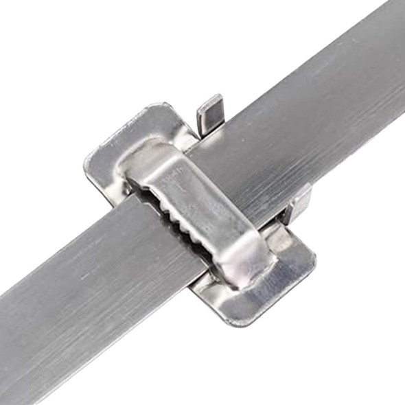 Close-up of stainless steel strapping secured with a metal banding buckle for industrial fastening