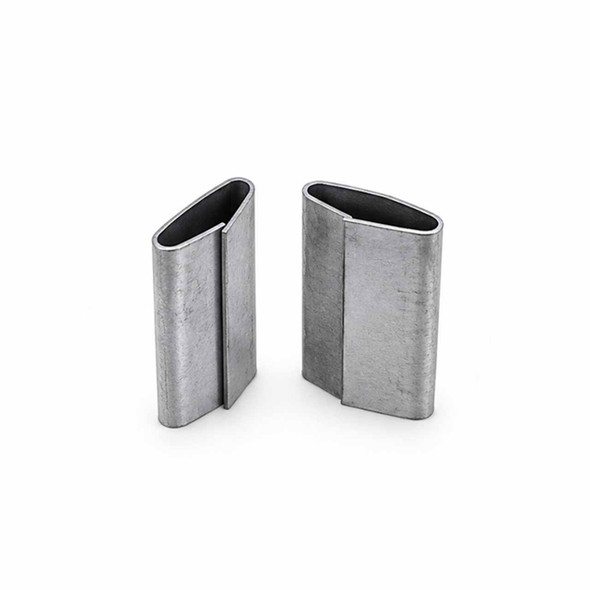 Two regular-duty closed steel strapping seals standing upright to show the open ends and overlapping seams