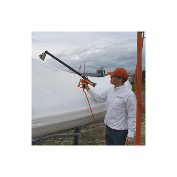 Ripack heat gun extension wand being used to shrink wrap a boat