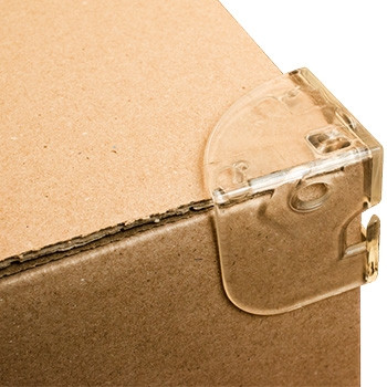Biodegradable Corner Spike Tie-Off Tool installed on a corrugated carton corner to anchor stretch film, rope, or twine